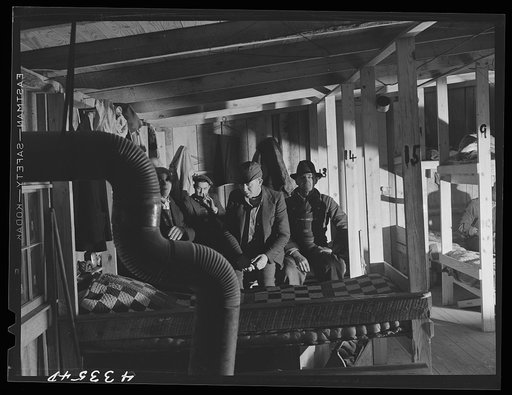 Untitled photo, possibly related to: A bunk house for thirty or forty men built by a filling station proprietor behind his store. It has upper and lower bunks. Near Silver Lake, North Carolina