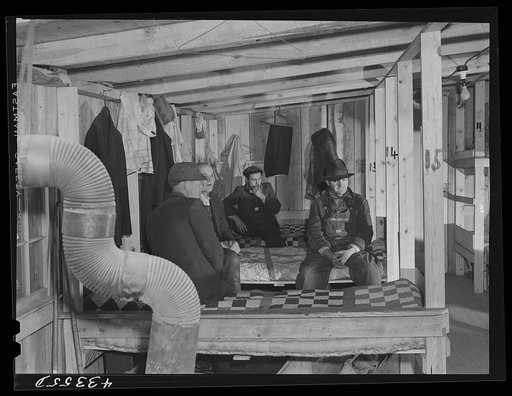 A bunk house for thirty or forty men built by a filling station proprietor behind his store. It has upper and lower bunks. Near Silver Lake, North Carolina