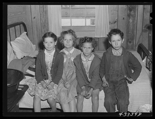Children of families living in a tobacco barn near Fayetteville, North Carolina. Fathers work at Fort Bragg