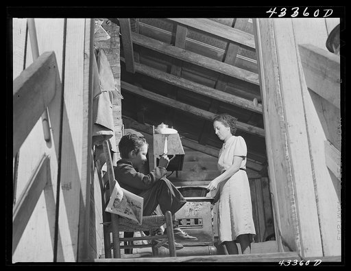 Untitled photo, possibly related to: Children of workers from Fort Bragg living in a tobacco barn converted into living quarters near Fayetteville, North Carolina