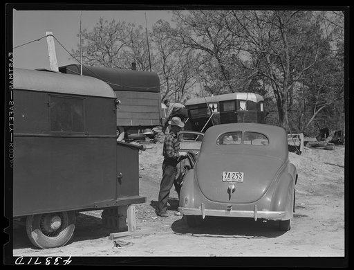 In a trailer settlement of workers from Fort Bragg. Manchester, North Carolina. The closest trailer is occupied by workers who came from Idaho