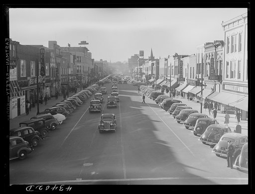 Untitled photo, possibly related to: Traffic on the main street of Fayetteville, North Carolina at about five o'clock, when the workers start coming out of Fort Bragg, North Carolina