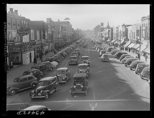 Untitled photo, possibly related to: Traffic on the main street of Fayetteville, North Carolina at about five o'clock, when the workers start coming out of Fort Bragg, North Carolina