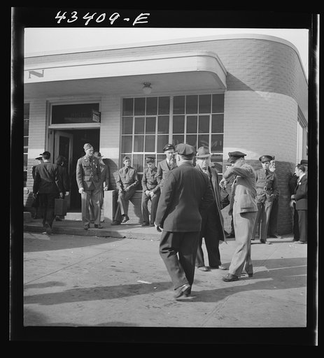 Untitled photo, possibly related to: Crowds outside the bus station in Fayetteville, North Carolina