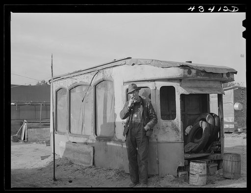 Construction worker from Fort Bragg. He lives in this homemade bunkhouse in Manchester, North Carolina