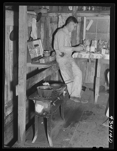 Migratory worker employed at Fort Bragg living in this old barn near Manchester, North Carolina