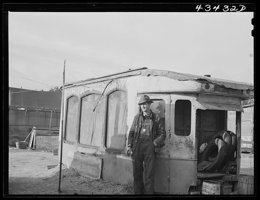 Untitled photo, possibly related to: Construction worker from Fort Bragg. He lives in this homemade bunkhouse in Manchester, North Carolina