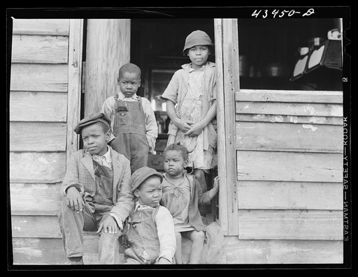 Family of small landowner who moved out of the Santee-Cooper Basin, at their "new home" near Bonneau, South Carolina