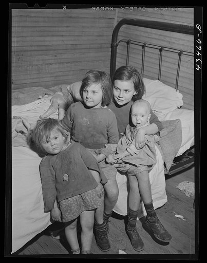 Untitled photo, possibly related to: Children of a "squatter" family who were preparing to move out of the Camp Croft area. Near Spartanburg, South Carolina