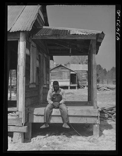 These houses were on an eight acre plot where eight Negro families were resettled by a landowner whose plantation was to be flooded by the Santee-Cooper navigation project. Near Moncks Corner, South Carolina