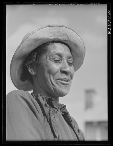 Woman who had been moved out of the Santee-Cooper basin to Orangeburg Farms, a FSA (Farm Security Administration) project in Orangeburg County, South Carolina