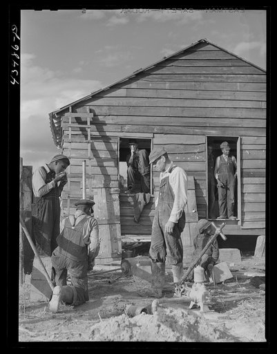 Installing a pump at a house rebuilt for a family who had moved out of the Santee-Cooper basin. Near Bonneau, South Carolina