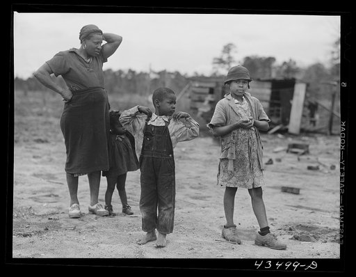 This family had moved out of the Santee-Cooper basin and were trying to get an addition built to their small "new" house. Near Bonneau, South Carolina