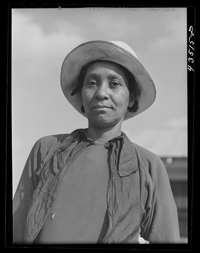 Woman who had been moved out of the Santee-Cooper basin to Orangeburg Farms, a FSA (Farm Security Administration) project in Orangeburg County, South Carolina