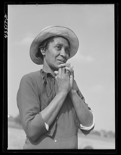 Woman who had been moved out of the Santee-Cooper basin to Orangeburg Farms, a FSA (Farm Security Administration) project in Orangeburg County, South Carolina