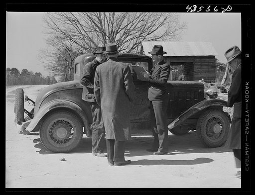 Untitled photo, possibly related to: FSA (Farm Security Administration) representative interviewing a farmer who must move out of the Camp Croft area. Whitestone, South Carolina