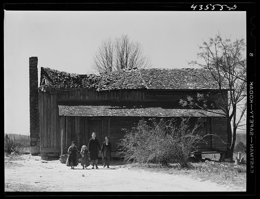 House occupied by "squatter" family that was preparing to move out of the Spartanburg Army camp area. Near Whitestone South Carolina