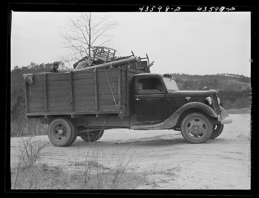 Untitled photo, possibly related to: A tenant family in the Camp Croft area watching their belongings being moved out. Near Whitestone, South Carolina
