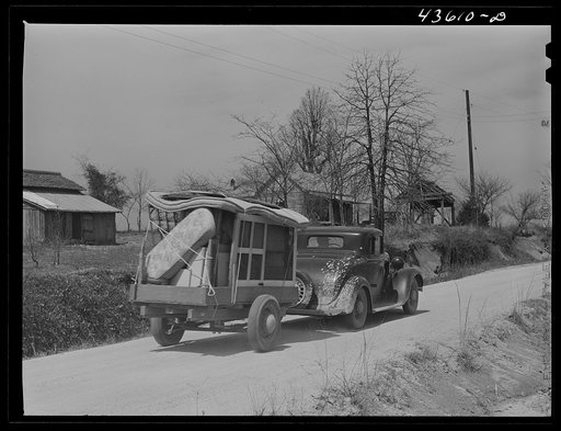 Their belongings packed on a small trailer, this family is moving out of the Spartanburg camp area. Near Whitestone, South Carolina region