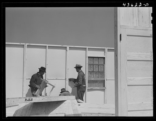 Untitled photo, possibly related to: Working on a prefabricated house near Pacolet, South Carolina