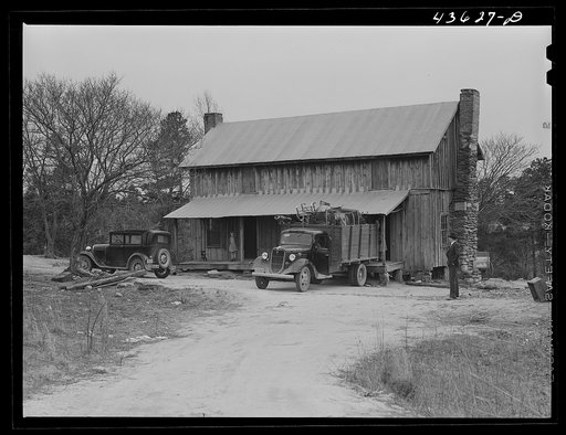 Untitled photo, possibly related to: A tenant family in the Camp Croft area watching their belongings being moved out. Near Whitestone, South Carolina