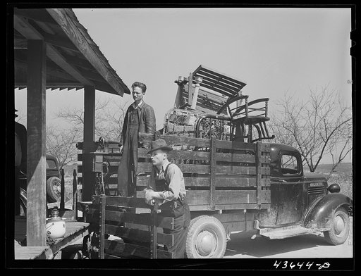 Moving the belongings of the Harvey sisters, old residents of the Camp Croft area. Near Whitestone, South Carolina