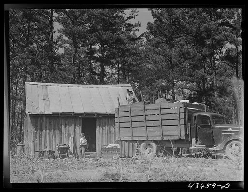 Untitled photo, possibly related to: Negro family moving out of Camp Croft area collecting some belongings from a relative. Near Spartanburg, South Carolina region