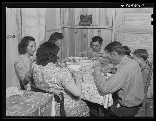 Untitled photo, possibly related to: Dinner time at the family of Levy Usher at Hazlehurst Farms. Hazlehurst, Georgia