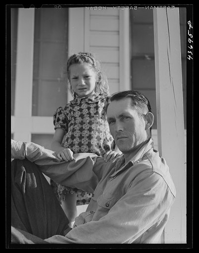 Levy usher and his little girl living at Hazlehurst Farms Inc., Hazlehurst, Georgia