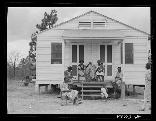Negro family and their neighbors at Hazlehurst Farms Inc., Hazlehurst, Georgia. They had moved from the Camp Stewart area only a week ago.