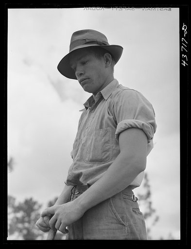 James Butler, one of the farmers who moved out of the Camp Stewart area to Hazlehurst Farms Inc. He was clearing land at twenty-five cents an hour. Hazlehurst, Georgia
