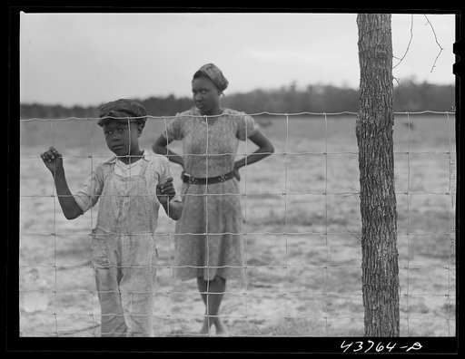 Untitled photo, possibly related to: Two of the Negro people who have been moved out of the Camp Stewart area near Hinesville to Hazlehurst Farms. Hazlehurst, Georgia