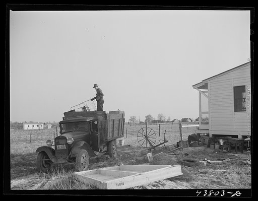 Moving into a prefabricated house at the FSA (Farm Security Administration) project near Pacolet, South Carolina