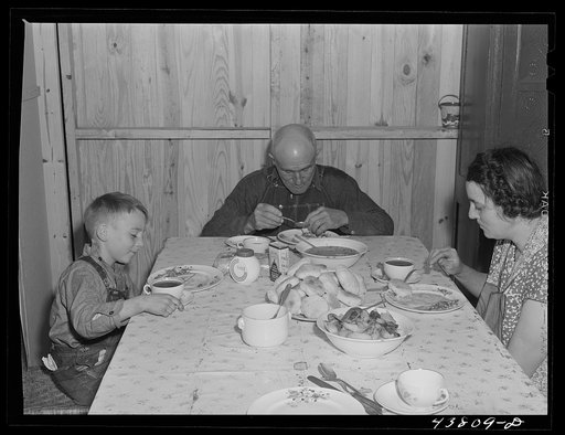 Untitled photo, possibly related to: Family having lunch at their new prefabricated house at Pacolet, South Carolina
