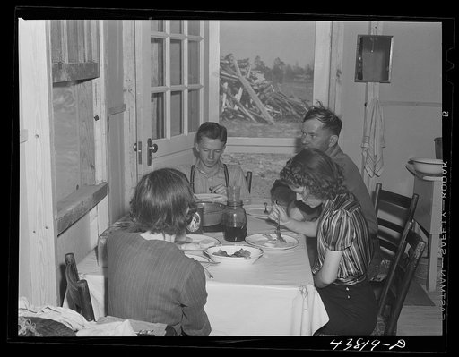 The family of Mr. B. B. West having lunch in their new prefabricated house at Pacolet, South Carolina