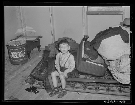 Little boy whose family has just moved into a new prefabricated house at Pacolet, South Carolina
