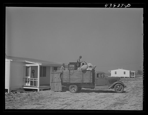 The Lee family moving into their new prefabricated house at Pacolet, South Carolina