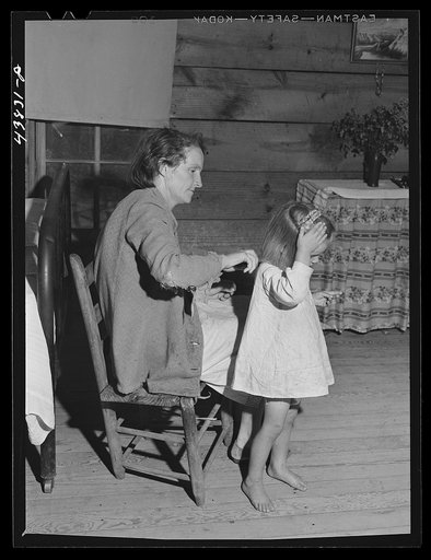 FSA (Farm Security Administration) borrower and tenant with one of her children. Heard County, Georgia