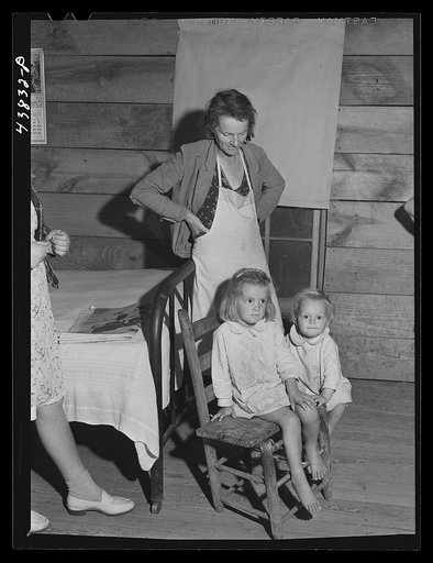 Untitled photo, possibly related to: FSA (Farm Security Administration) borrower and tenant with one of her children. Heard County, Georgia