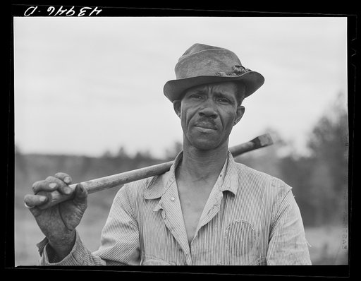 Untitled photo, possibly related to: Henry Dukes, Negro FSA (Farm Security Administration) borrower, burning charcoal. Southwestern part of Heard County, Georgia