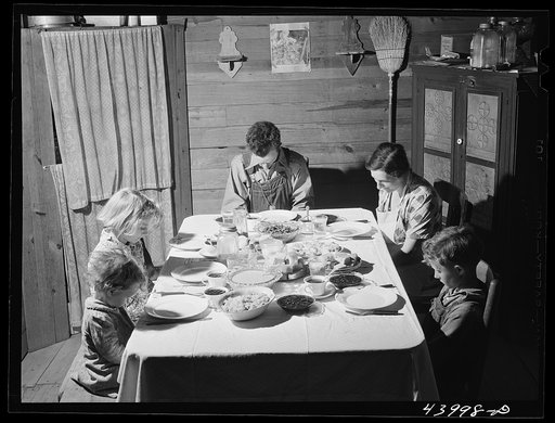 Untitled photo, possibly related to: Smith family saying grace at the afternoon meal. Carroll County, Georgia (see general caption)
