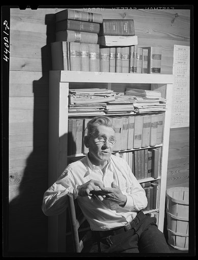 Mr. J. H. Parham, barber and notary public, in his shop in Centralhatchee, Heard County, Georgia