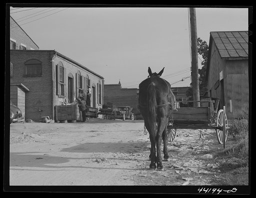 In back of the Bickers-Goodwin store in Greensboro on a Saturday. Greene County, Georgia