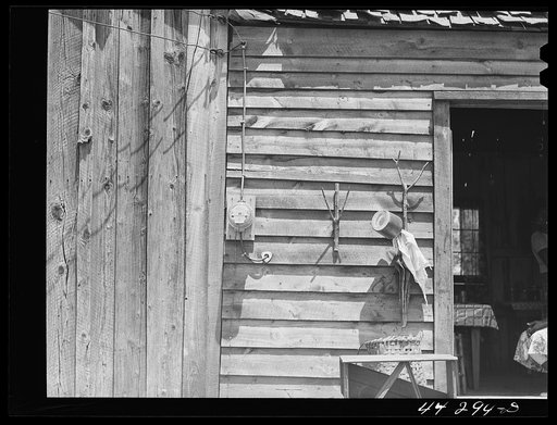 Untitled photo, possibly related to: Negro tenant farmer's house showing REA (Rural Electrification Administration) electric meter on wall. Greene County, Georgia