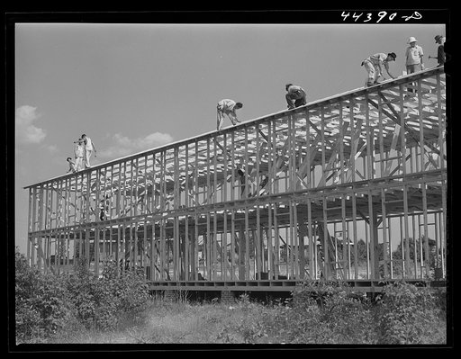 A huge bunkhouse in construction to accomodate expected workers for the new powder plant. Childersburg, Alabama