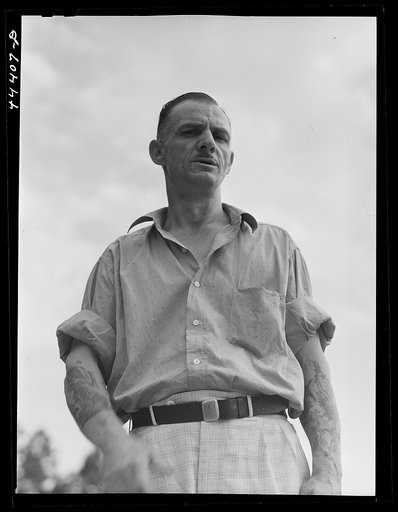 Untitled photo, possibly related to: Dutch Gross, ex world war veteran, trapeze artist, airplane stunt man, friend of "Spike" Conner, the famous blood donner, and the only man to fall out of an airplane at 2000 feet and live (he fell on high tension wire)  Better known as "the Flying Dutchman," he h