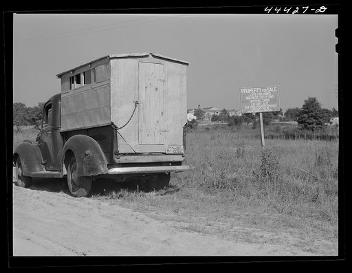 Two workmen employed at some new railroad construction at Childersburg live in this truck. Childersburg, Alabama