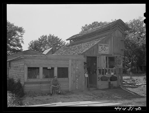 Untitled photo, possibly related to: A shoe repair shop, recently constructed, in Childersburg, Alabama