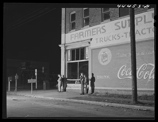 Soldiers from a nearby camp waiting for a bus in Anniston, Alabama