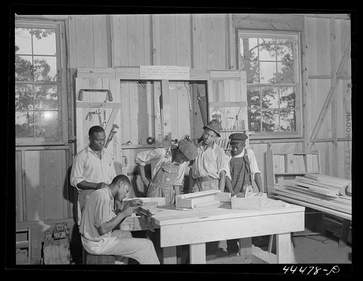 Negro youngsters learning how to sharpen saws in a new vocational school. Greene County, Georgia